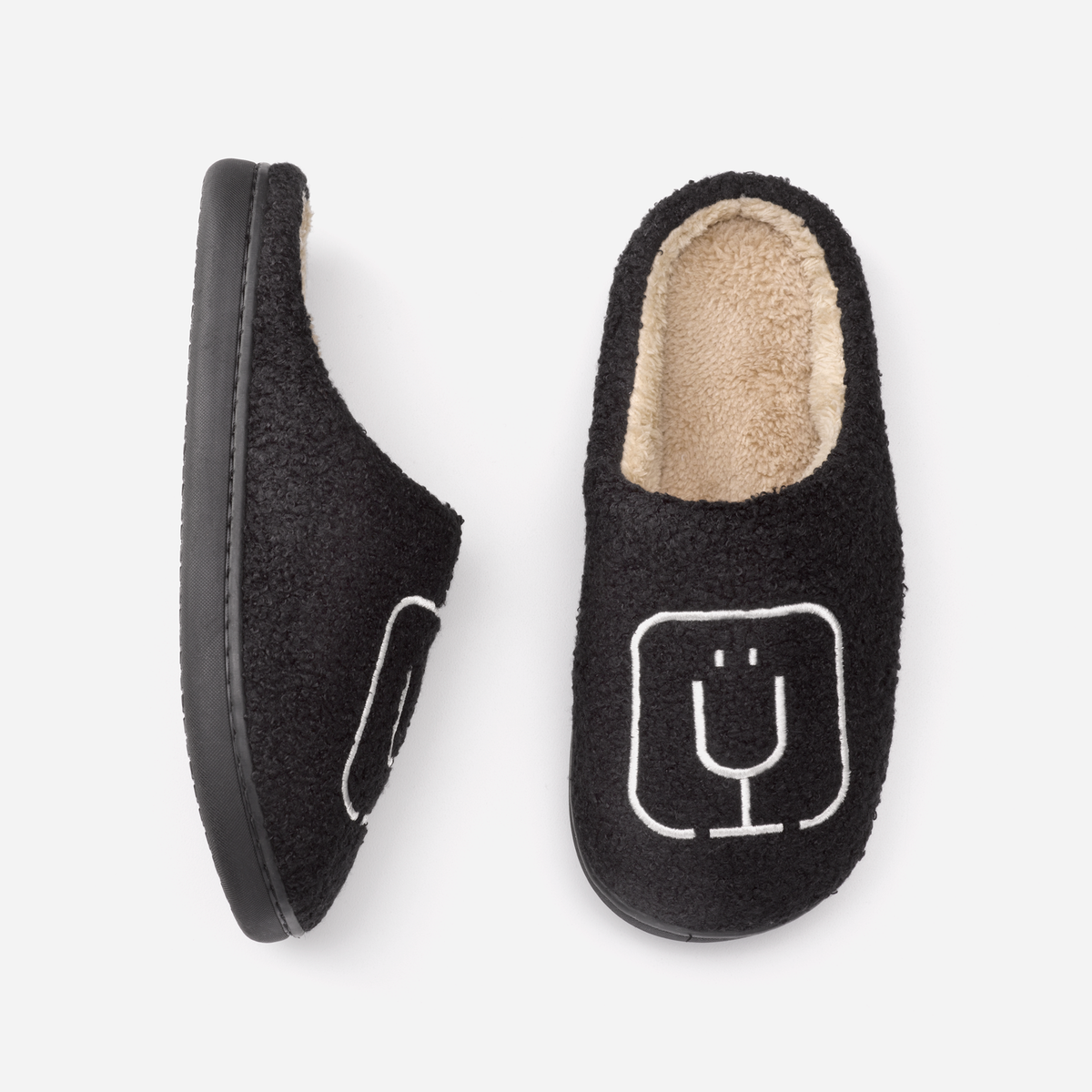 brumate-fuzzy-slippers-black-l1 apparel-slippers-above.png